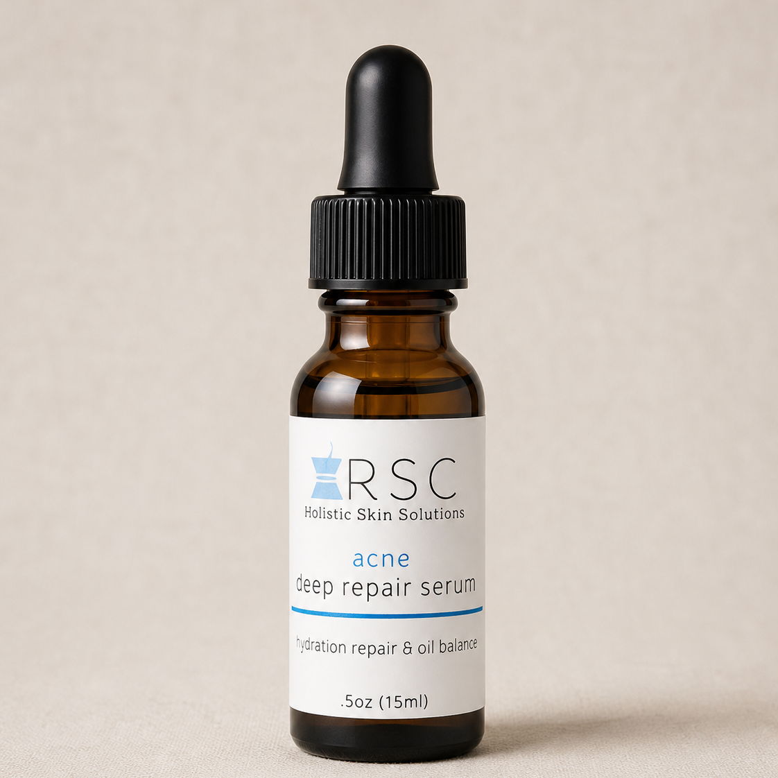 Bottle of RSC acne deep repair serum on a beige background